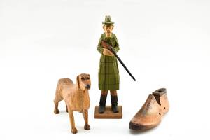 lot 107 image: Three Carved Wooden Statuettes