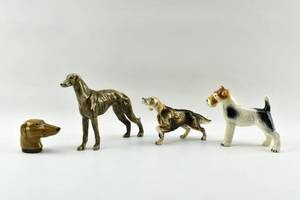 lot 149 image: Group of Three Dog Statuettes and One Salt Shaker