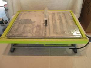 lot 110 image: Ryobi electric 7 tile saw with rep...