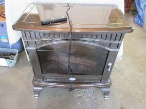 lot 131 image: Decorative electric Dimplex firepla...