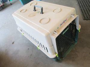 lot 149 image: Remington animal travel crate...