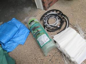 lot 155 image: Lawn seed blanket and tarp with an ...