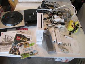lot 188 image: Nintendo Wii with controllers, cord...