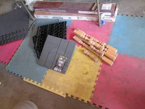 lot 191 image: 2 bottles of mis-match wood floorin...