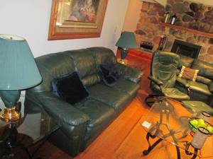 lot 18 image: Faux leather couch love seat, rocker plus