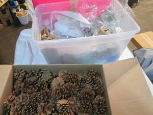 lot 57 image: Pine cone and glass decor...