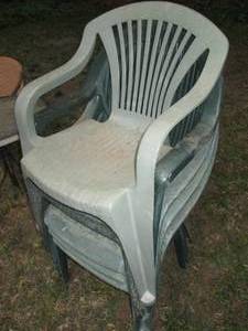 lot 67 image: Stack of 5 plastic outdoor chairs...