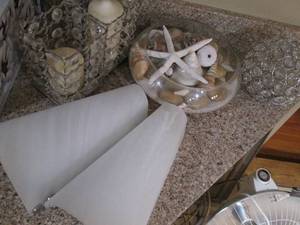 lot 84 image: Home decor and sea shells, sconces...