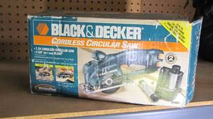 lot 243 image: Black and Decker cordless 7.4v circ...