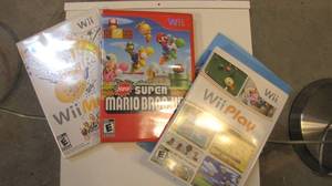 lot 289 image: (2) Nintendo Wii games and (1) Wii ...