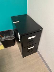lot 1 image: Two door metal filing cabinet