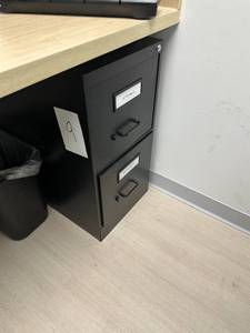lot 9 image: Two door metal filing cabinet 15x25x29