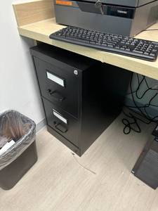 lot 12 image: Two door metal filing cabinet 15x25x29