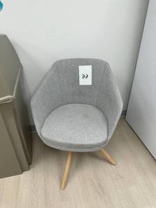 lot 22 image: Grey fabric sitting chair