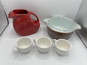 lot 23 image: Vintage Fiesta Coffee Cups, Saucers, and Pyrex Casserole Dish with Lid