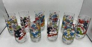 lot 30 image: Vintage 1983 Smurfs Drinking Glasses lot of 10