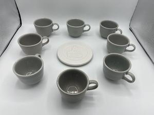 lot 35 image: Vintage Gray Fiesta Coffee Cups and Trivet