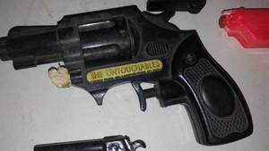 Vintage plastic water pistols and more. Untouchables.