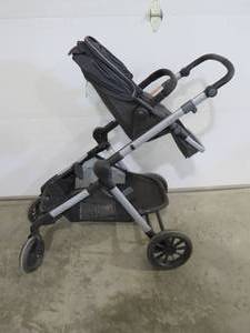 lot 12 image: EvenFlo Expand Stroller with Removable Baby Carrier
