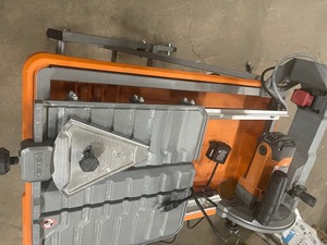 lot 18 image: Rigid 7 in Wet Tile Tile Saw damaged tray customer return see pictures
