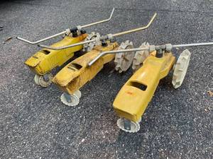 lot 115 image: Three Tractor Lawn Sprinklers with Two Being Nelson
