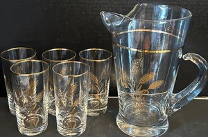 lot 309 image: Vintage West Virginia Golden Glass Wheat Themed Pitcher and Tumblers