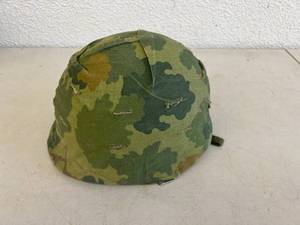 lot 104 image: Military Helmet