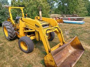 lot 1 image: Massey Ferguson 20C Industrial Tractor with Massey Ferguson Model MF 32A Industrial Loader Dirt Bucket, Snow Bucket and 3-pt. 45-inch Bale Spear