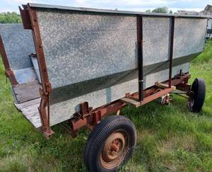 lot 6 image: Galvanized Wagon Box with Century Hoist and Running Gear, Has the End Gate and Appears to be in Good Condition