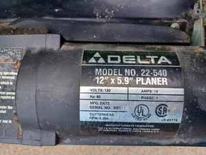 lot 25 image: Delta 12-inch X 5.9-inch Portable Planer, NOTE Pick-up for this item is by appointment and is located at 3455 Weeks Avenue, Winsted, MN 55395