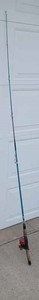 lot 42 image: Fishing Reel with Fiberglass Fishing Rod