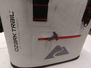 lot 57 image: Ozark Trailer Cooler and a New Ford Windshield Shade