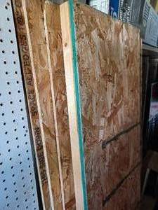 lot 74 image: Assorted Partial Sheets of Pegboard, Several 2 X 4s Fastened to Partial Sheets of Chipboard