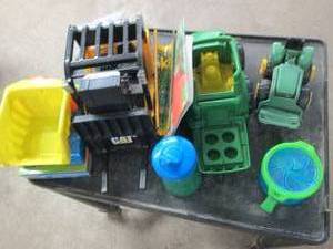 lot of kids toys, cups and books ...
