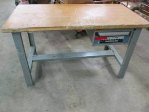 table with metal legs and wood top ...