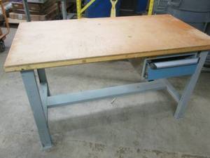 table with metal legs and wood top ...
