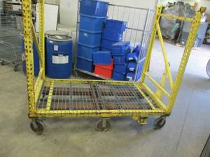 yellow cart on wheels with a hitch ...