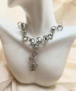 lot 13 image: 3D Geometric Triangle Drop Necklace and Earrings Set
