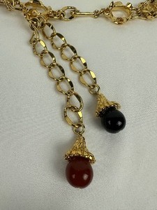 lot 18 image: Two Vintage Gold Tone Belts