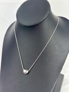 lot 21 image: Tiffany and Co Sterling Silver Bean Pendant Necklace