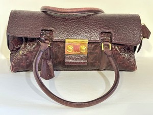lot 230 image: Louis Vuitton Limited Edition Bordeaux Volupte Beaute Satchel