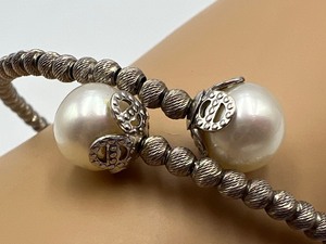 lot 56 image: Shimmery Sterling Silver and Pearl Bracelet
