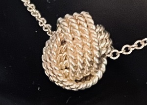 lot 65 image: Tiffany & Co Sterling Silver Knot Pendant Necklace