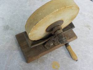 lot 19 image: Vintage Grinding Stone GS.Co. with ...