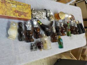 lot 75 image: Avon Full Bottles...