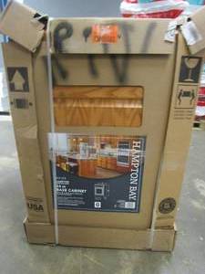 lot 207 image: Hampton Bay Hampton 24 in. W x 24 in. D x 34.5 in. H Assembled Base Kitchen Cabinet in Medium Oak with Drawer Glides (SIDE PANEL IS SLIGHTLY DAMAGED, SEE PHOTOS)