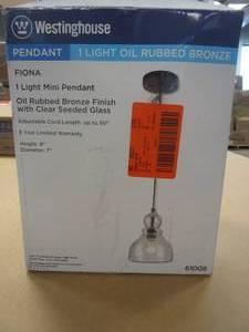 lot 313 image: Westinghouse 1-Light Oil Rubbed Bronze Adjustable Mini Pendant with Hand-Blown Clear Seeded Glass