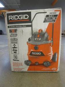 lot 322 image: RIDGID 16 Gallon 6.5 Peak HP NXT WetDry Shop Vacuum with Cart, Fine Dust Filter, Locking Hose and Accessories - OPEN BOX