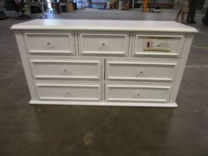 lot 361 image: Picket House Furnishings, Isabella Youth 7 Drawer Dresser White, 34.0 Inches (H) x 53.0 Inches (W) x 17.0 Inches (D) - SCRATCH AND DENT, MISSING FEET.