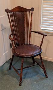 lot 34 image: Vintage Leather Accented Wood Armchair